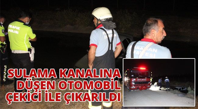 Sulama kanalına düşen otomobil çekici ile çıkarıldı