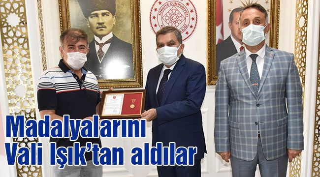 Madalyalarını Vali Işık'tan aldılar
