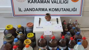 Karaman'da jandarma el yapımı rakı ile şarap ele geçirdi