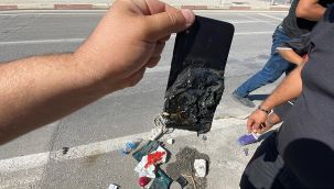 Akülerin üzerinde unutulan cep telefonu patladı